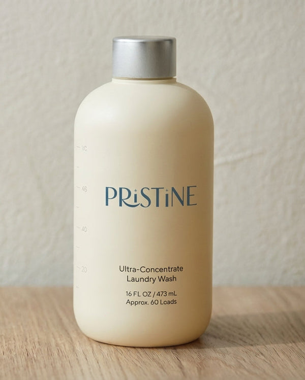 Pristine laundry wash bottle on a wooden surface with a neutral background 